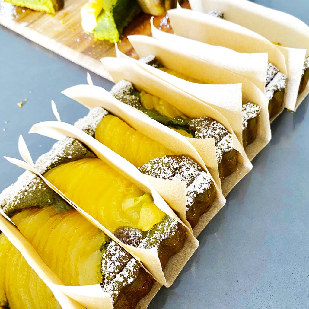 Sliced Matcha Pear Tart in parchment paper