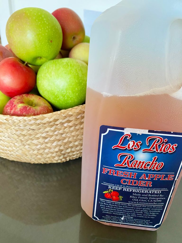 Apple cider and apples
