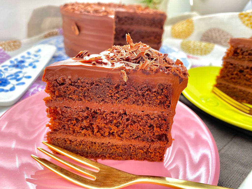 Vegan double chocolate ganache cake with olive oil on a plate