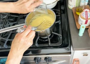 Adding butter into the custard