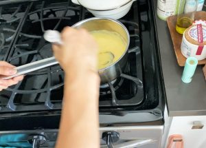 Cooking custard cream in a pot