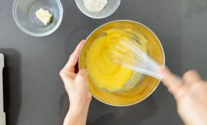 Mixing egg and sugar