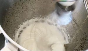 Add syrup to meringue to make Italian meringue