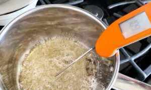 Boiling syrup for Italian meringue in a pot