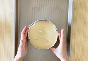 Coffee sponge cake batter in a cake pan