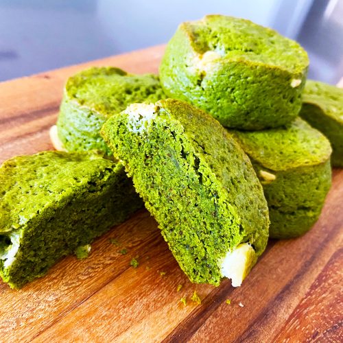 Matcha white chocolate scones on a board