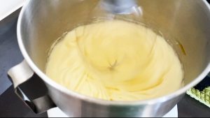 Whisk eggs and sugar in a bowl