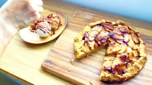 Drizzle caramel sauce on apple galette