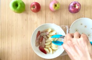 Stir microwaved apple compote