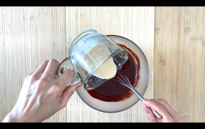 Add soy milk and rum to ganache