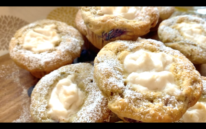 Dust muffins with powdered sugar