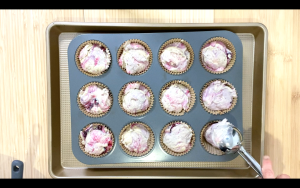 Scoop batter into cups