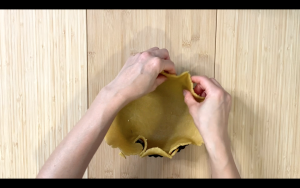 Line pan with dough