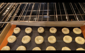 Bake cookies in oven