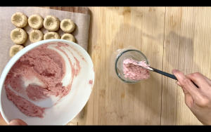 Fill piping bag with strawberry white chocolate