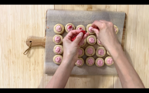 Sprinkle freeze dried strawberries on top of the cookies