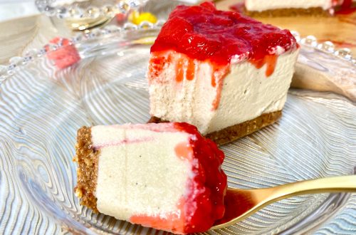 Vegan gluten-free strawberry cheesecake with a fork